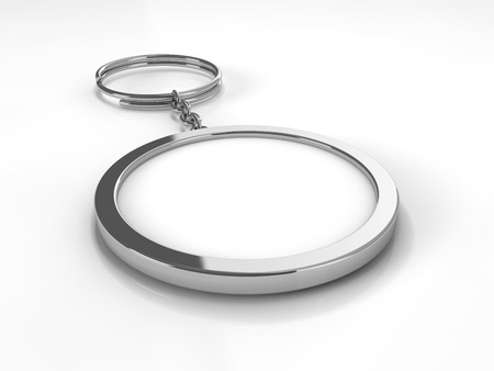 3D rendering illustration of a blank metal keychain with a ring for a key, Isolated on a changeable background. Ideal template for branding, identity guidelines and promo campaigns.の写真素材