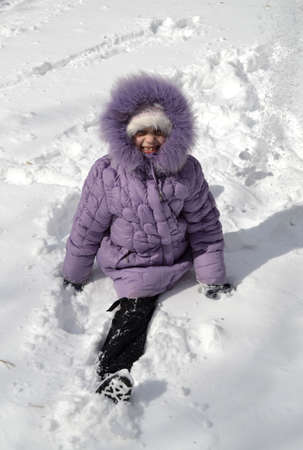 Girl in the snowの写真素材