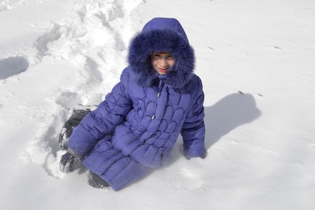 Girl in the snowの写真素材