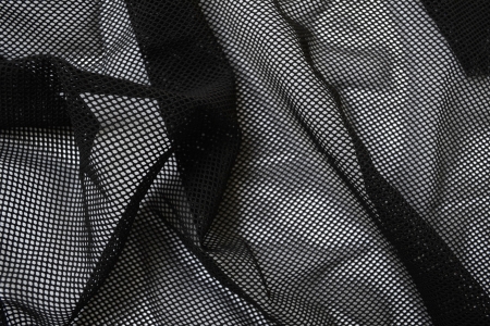a piece of black mesh fabricの写真素材