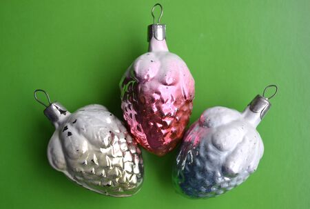 old Christmas decorations on a green backgroundの写真素材