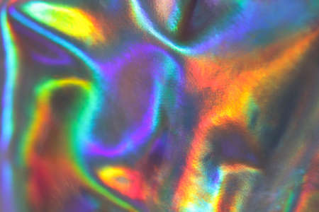 Holographic reflective multi-colored metallic material. Rainbow colors