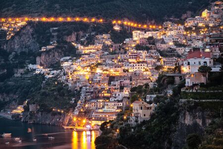 Positano profile view, with the street lights on.の写真素材