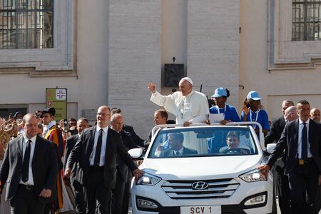 Vatican, Italy - September 3, 2016: Pope Francis on the new pope mobile, waving to the crowd of faithful gathered in St. Peter's Square, for the sanctification of Mother Teresa of Calcutta.のeditorial素材