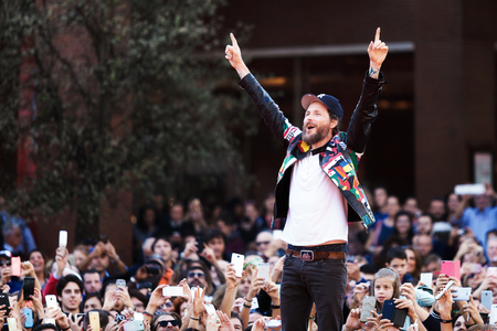 Rome, Italy - October 16, 2016. The Italian singer Jovanotti with his fans on the red carpet of the...