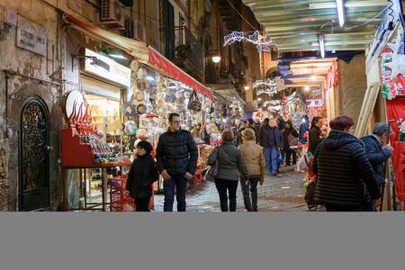 Naples, Italy - December 9, 2016: The Christmas holiday atmosphere in the heart of the city. San Gregorio Armeno, the most famous street in the world for the sale of cribs and commemorative statues.のeditorial素材