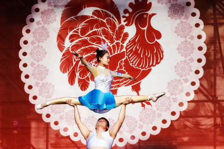 Rome, Italy - January 28, 2017: Celebration of the Chinese New Year in Rome, the year of the rooster. Acrobatic dance, performances on the stage set up in Piazza del Popolo.のeditorial素材