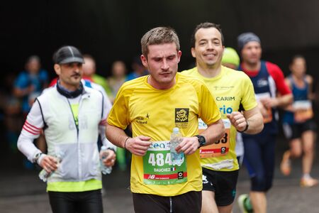 Rome, Italy - April 2nd, 2017: Athletes of the 23rd Rome Marathon to the passage of the tunnel Umberto I, a few kilometers from the finish.のeditorial素材