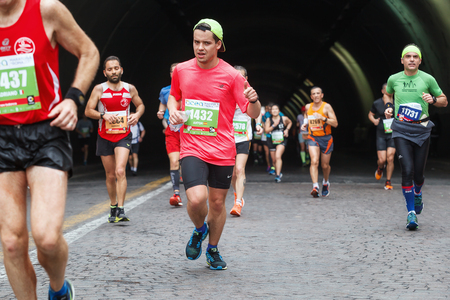 Rome, Italy - April 2nd, 2017: Athletes of the 23rd Rome Marathon to the passage of the tunnel Umberto I, a few kilometers from the finish.のeditorial素材