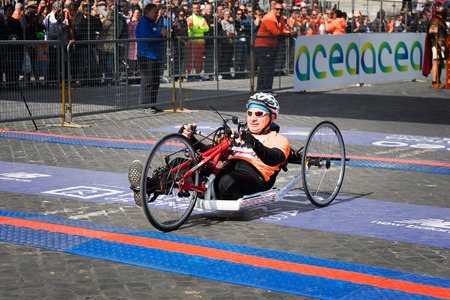 Rome, Italy - 8 April 2018: A handbike athlete on the finish line of the 24th edition of the Rome...