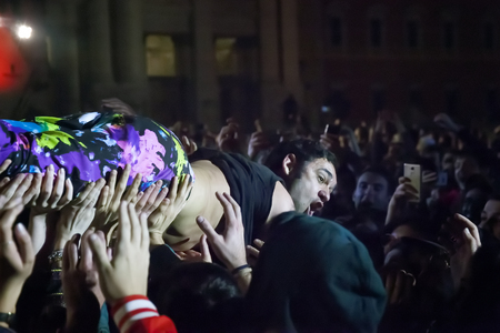 Rome, Italy - May 01, 2018: Cosmo performs on the stage of the concert of the first of May, in Piazza San Giovanni. The Italian singer incites the public in the square and at the end launches in a stage diving between the fans. Credit: Gennaro Leonardi/Alのeditorial素材