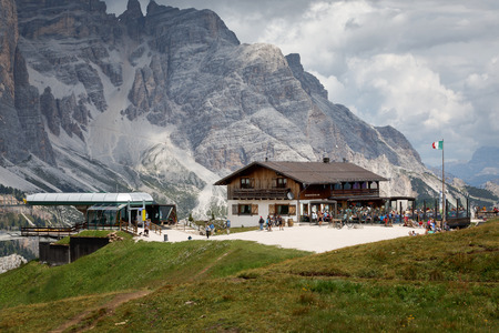 Cortina d'Ampezzo BL, Italy - August 18, 2018: The Scoiattoli mountain shelter with the attached chair lift, in the Cinque Torri area.のeditorial素材