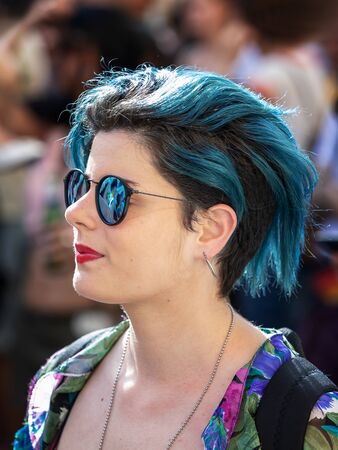 Rome, Italy - June 8, 2019: Gay Pride, public demonstration of the gay pride. Women of various nationalities parade through the streets of the capital with rainbow colors. They demonstrate for the rights of homosexuals, lesbians and same-sex couples.のeditorial素材