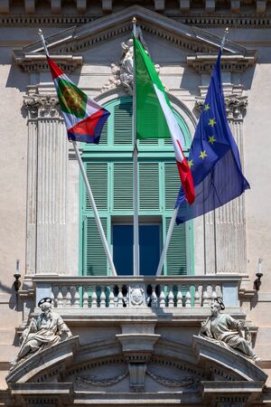 Rome, Italy - August 22, 2019: Quirinale, main entrance of the building, with fluttering flags. Institutional seat of the President of the Italian Republic.のeditorial素材
