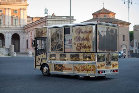 Rome, Italy - August 18, 2019: Van for food and beverage sales on the move. Van decked with tourist images of the city.のeditorial素材