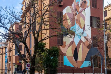 Rome, Italy - December 22, 2019: Murals in the museum district of Tor Marancia. Drawings by various street artists, on the facades of the buildings.のeditorial素材