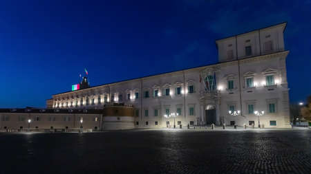 Rome, Italy - April 7, 2020: Piazza del Quirinale in the evening in the blue hour, illuminated with the colors of the Italian flag, on the bell tower of the Palazzo del Quirinale, seat of the President of the Republic.のeditorial素材