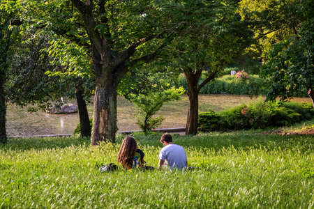 Rome, Italy - May 10, 2020: Villa Borghese, a couple of enjoys the freedom of being outdoors in the public park after the end of the restrictions due to the coronavirus pandemic.のeditorial素材