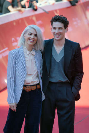 Rome, Italy - October 17, 2021: Red carpet of the film Mothering Sunday with Eva Husson (director) and Josh O'Connor (actor), at the Rome Film Festival, at Auditorium Parco della Musica.のeditorial素材