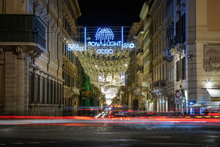 Rome, Italy - December 12, 2021: Via del Corso decorated with Christmas lights. Christmas themed neon designs in the capital city of Italy.のeditorial素材