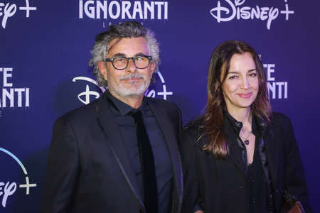 ROME, ITALY - APRIL 08: Paolo Genovese and wife Rizzo Federica attends the premiere of TV series Disney, "Le Fate Ignoranti" in front of Opera House in Rome.のeditorial素材