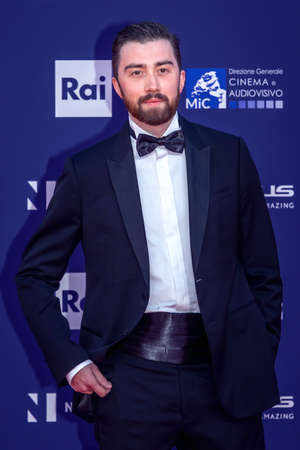 Rome, Italy - May 3, 2022: A guest attends the red carpet of the David di Donatello 2022 awards ceremony in Rome.のeditorial素材