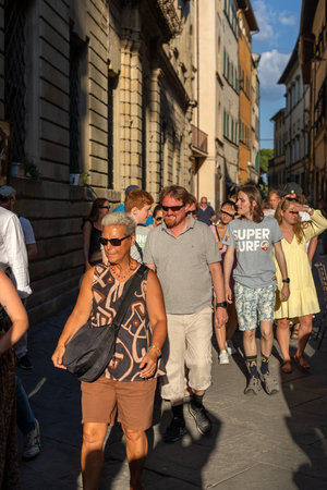 Cortona, Italy - July 15, 2022: people on the street in the small Tuscan town, home to the international photography festival "Cortona on the move".のeditorial素材