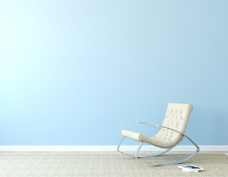 Modern interior with beige armchair near blue wall. Photo on book cover was made by me.の写真素材