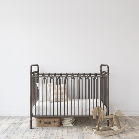 Farmhouse nursery. Black metal crib near empty white wall. Interior mock-up. 3d rendering.の写真素材