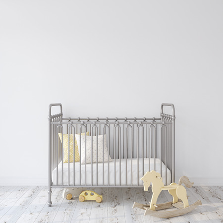 Farmhouse nursery. Gray metal crib near empty white wall. Interior mock-up. 3d rendering.の写真素材