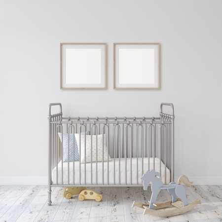 Farmhouse nursery. Gray metal crib near white wall. Two square wooden frames on the wall. Interior and frame mock-up. 3d rendering.の写真素材