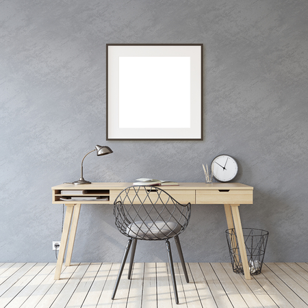 Home office. Interior and frame mockup. Wooden desk near gray wall. Black square frame on the gray wall. 3d render.の写真素材