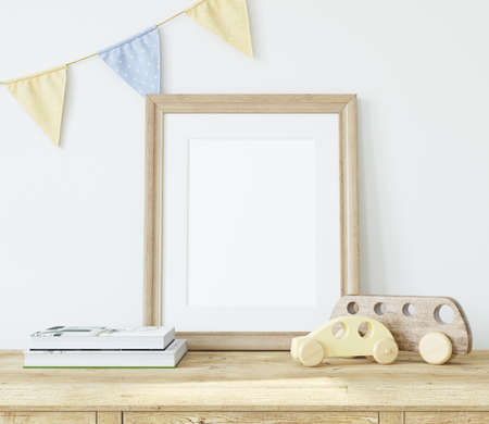 Frame mockup for kid's room. Interior with the wooden vertical frame near white wall. 3d rendering.の写真素材