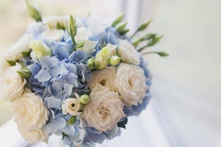 Beautiful wedding bouquet close up outdoor. Details of the wedding dayの写真素材