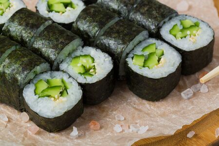 Sushi Roll with Cucumber and Sesame inside. Seaweed outsideの写真素材