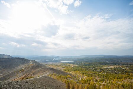 Steep mountain road. Ascent to the Pious Cross, Karabash. Chelyabinsk region, the dirtiest city on Earthの写真素材