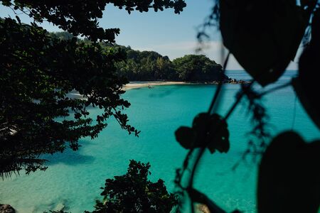 Hight view on tropical turquoise lagoon with sandy beach and tropical forest, Freedom beach, Phuket,...