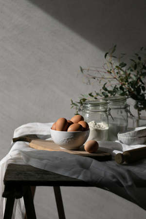 Bakery ingredients for homemade cooking or baking on table. Food set on wooden table. Copy spaceの写真素材