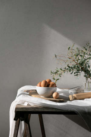 Bakery ingredients for homemade cooking or baking on table. Food set on wooden table. Copy spaceの写真素材
