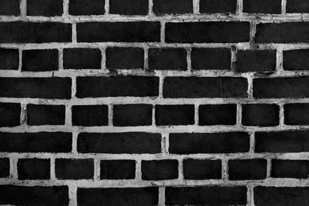 Dark Black Brick Wall Background. Urban Rough Grunge Gray Texture.