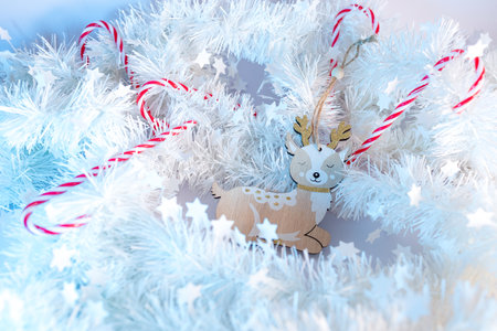 Christmas decoration of a deer and candy sticksの写真素材