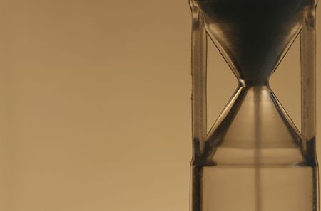 a clespsydra with a simple  color backgroundの写真素材