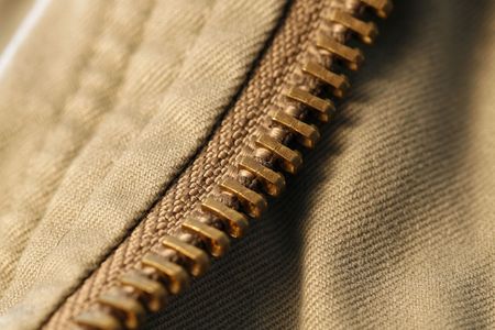 a detail  af a zipper in a jean jaket の写真素材