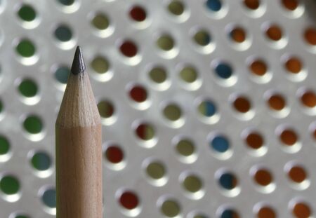 a pencil  with a simple  colorful backgroundの写真素材