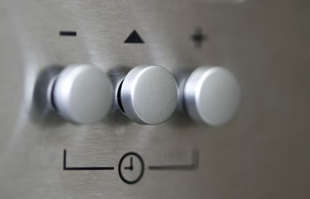 a silver knob of a oven taken with macro lensの写真素材