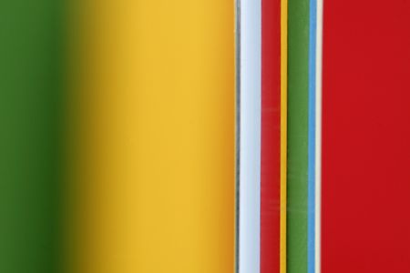 a glass with a simple  green - yellow - red color backgroundの写真素材