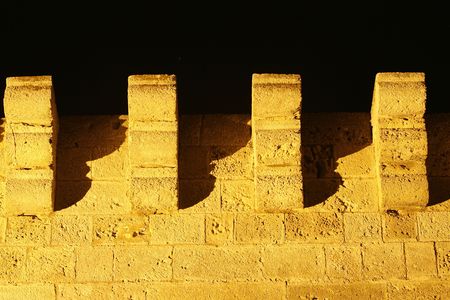 a part of a castle late at nightの写真素材