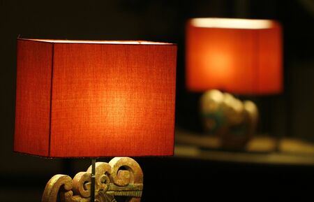 two open standing lamps in a lobby の写真素材