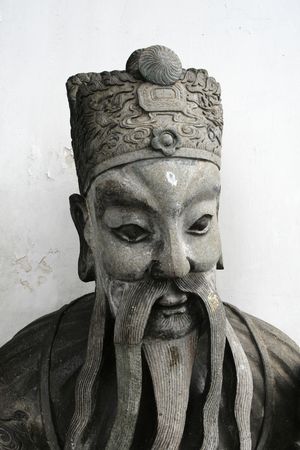 a  stone guardian  in a temple at Thailandの写真素材