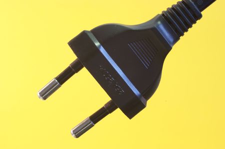 an  electricity fuse adaptor in a simple yellow background